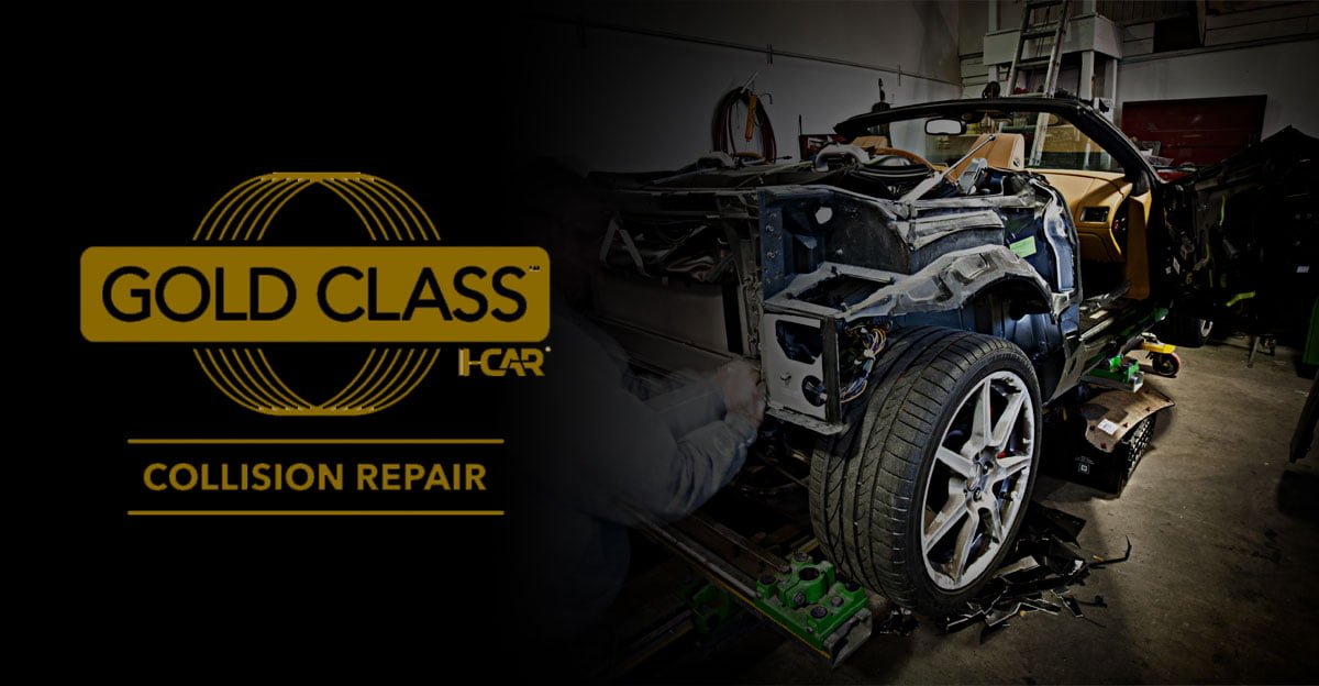 A Gold Class Collision Repair logo is next to a disassembled car in a certified auto body shop in southern Indiana, showing exposed parts and a partially visible technician working on the vehicle.